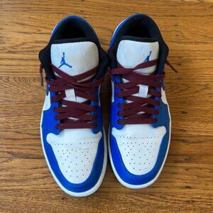 White and blue Jordan 1 low sneakers